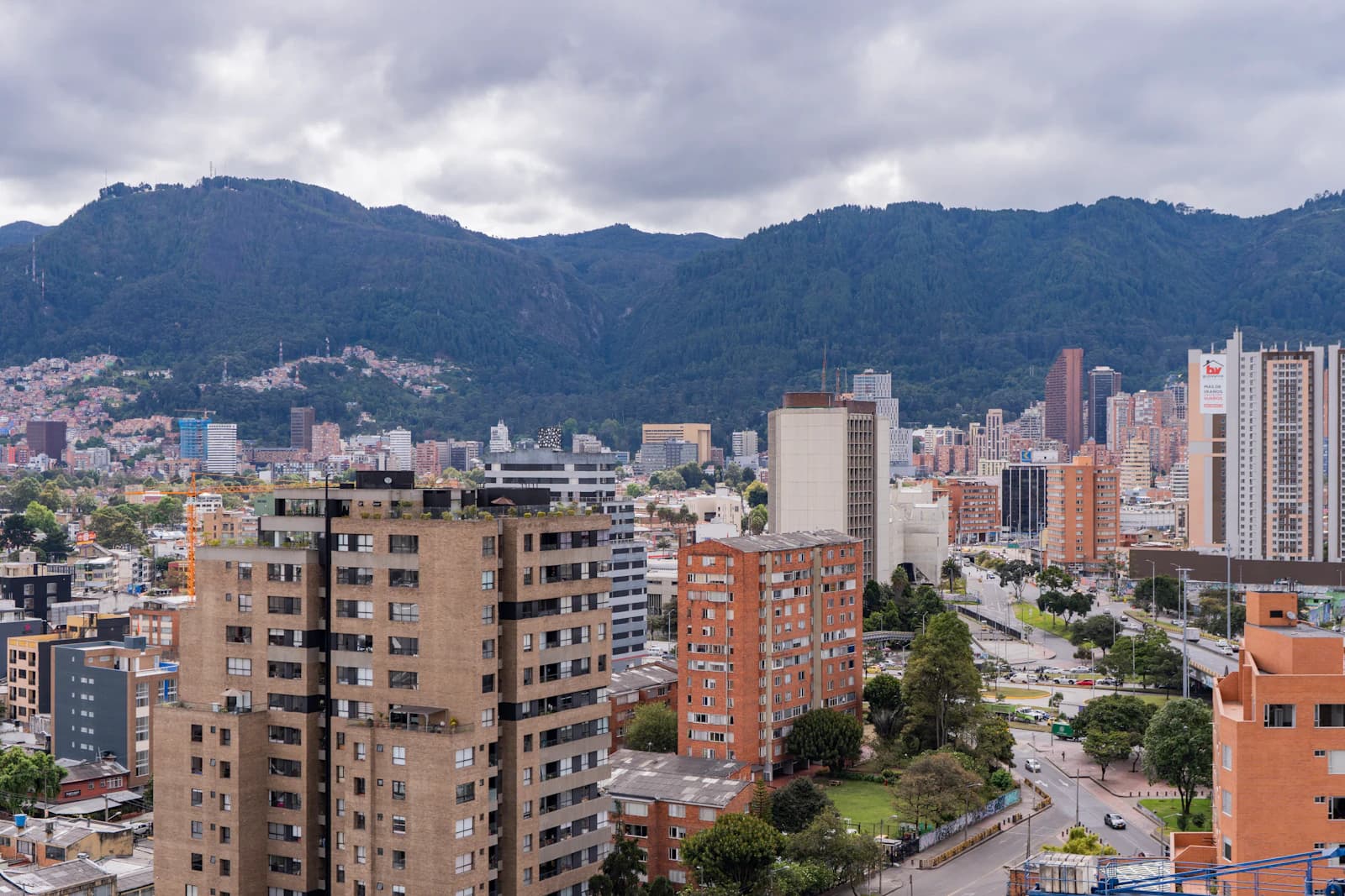 Buildings in Bogotá, Colombia, with the hills behind