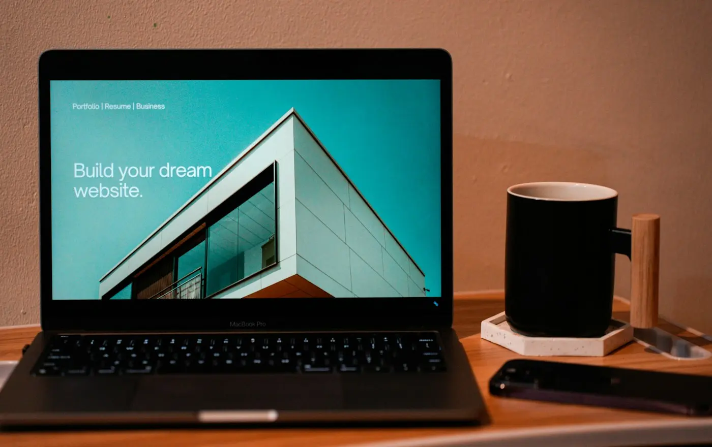 Laptop with a website builder open