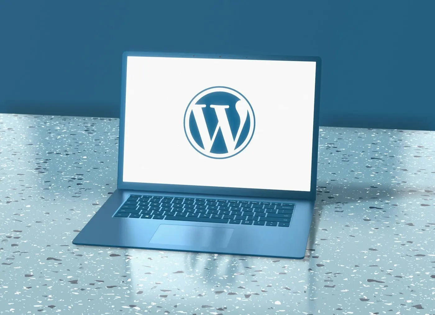 Laptop with the WordPress logo on screen