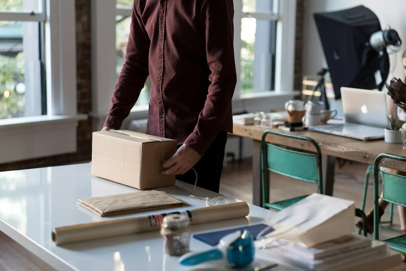 Person packing an order from their online store
