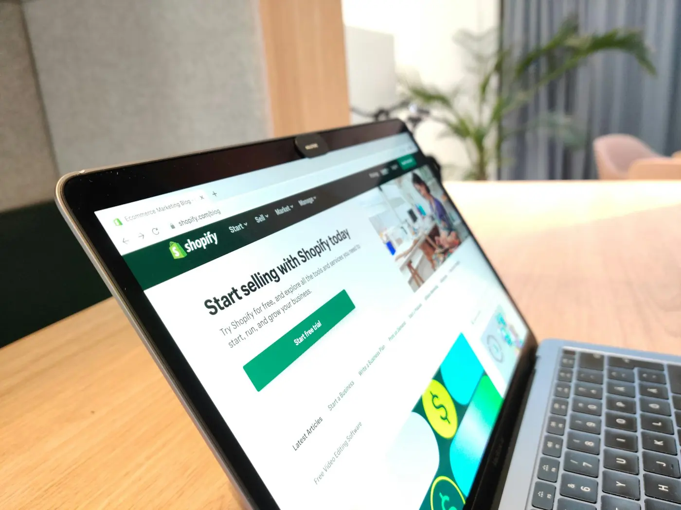 Laptop showing the Shopify page to start selling online